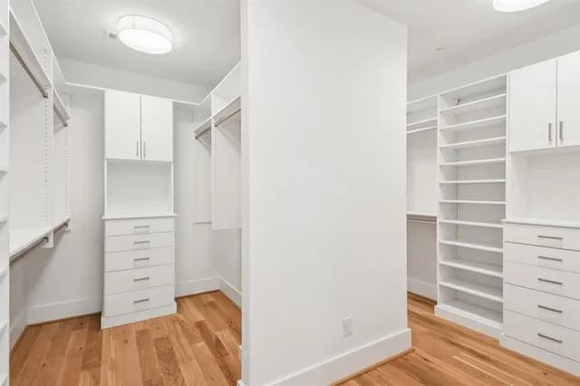 a outdoor space with patio fireplace couches and a dining table with garden view