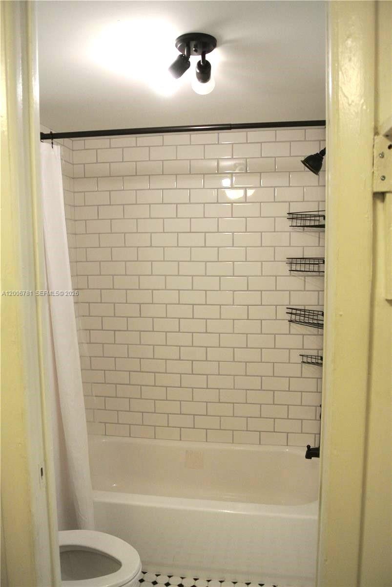 2160 Southwest 16th Avenue, Unit 417 Miami, FL 33145 - Photo 16 of 24 a bathroom with a shower