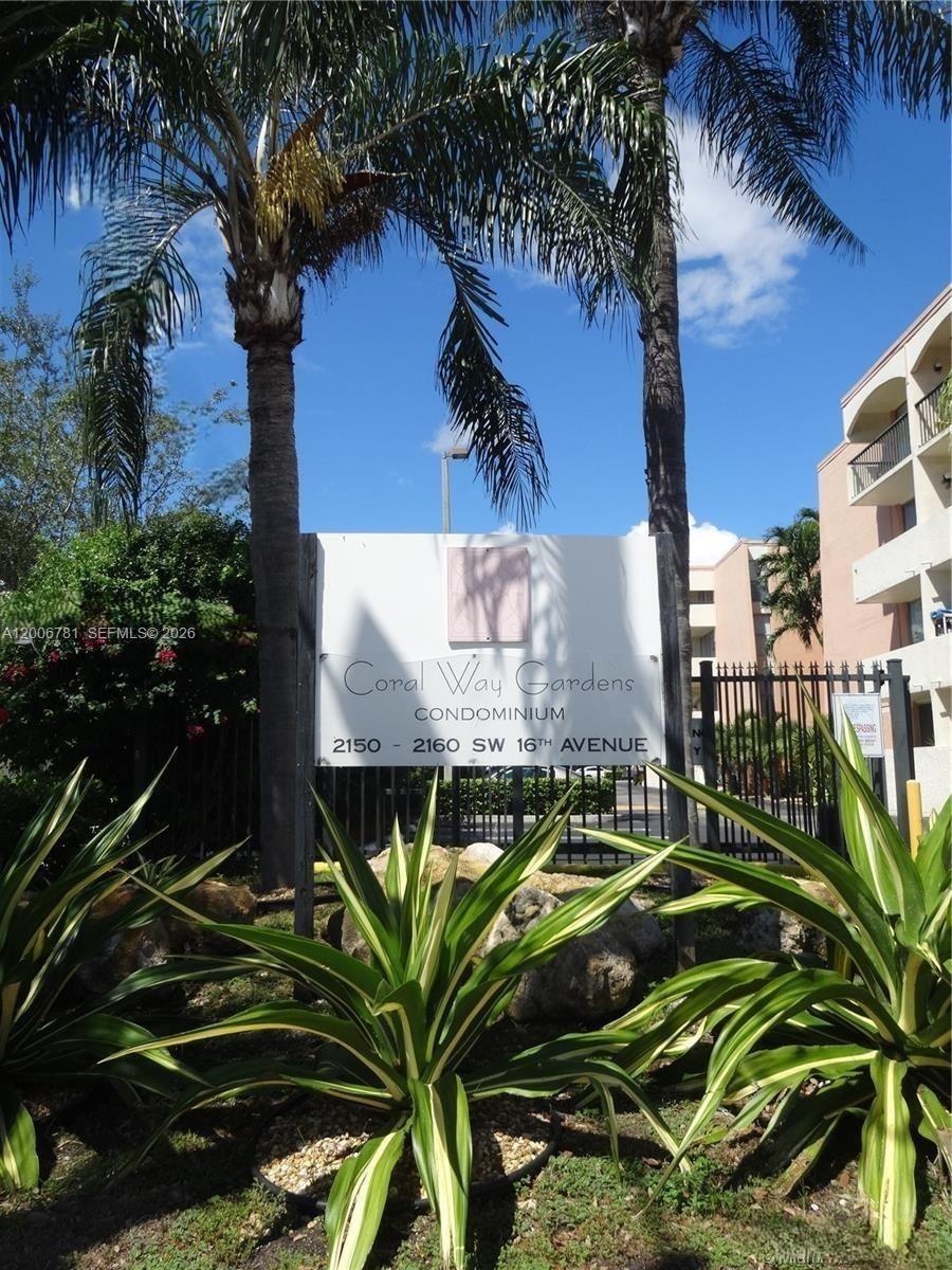 2160 Southwest 16th Avenue, Unit 417 Miami, FL 33145 - Photo 2 of 24 a view of a palm plant that is sitting in front of house