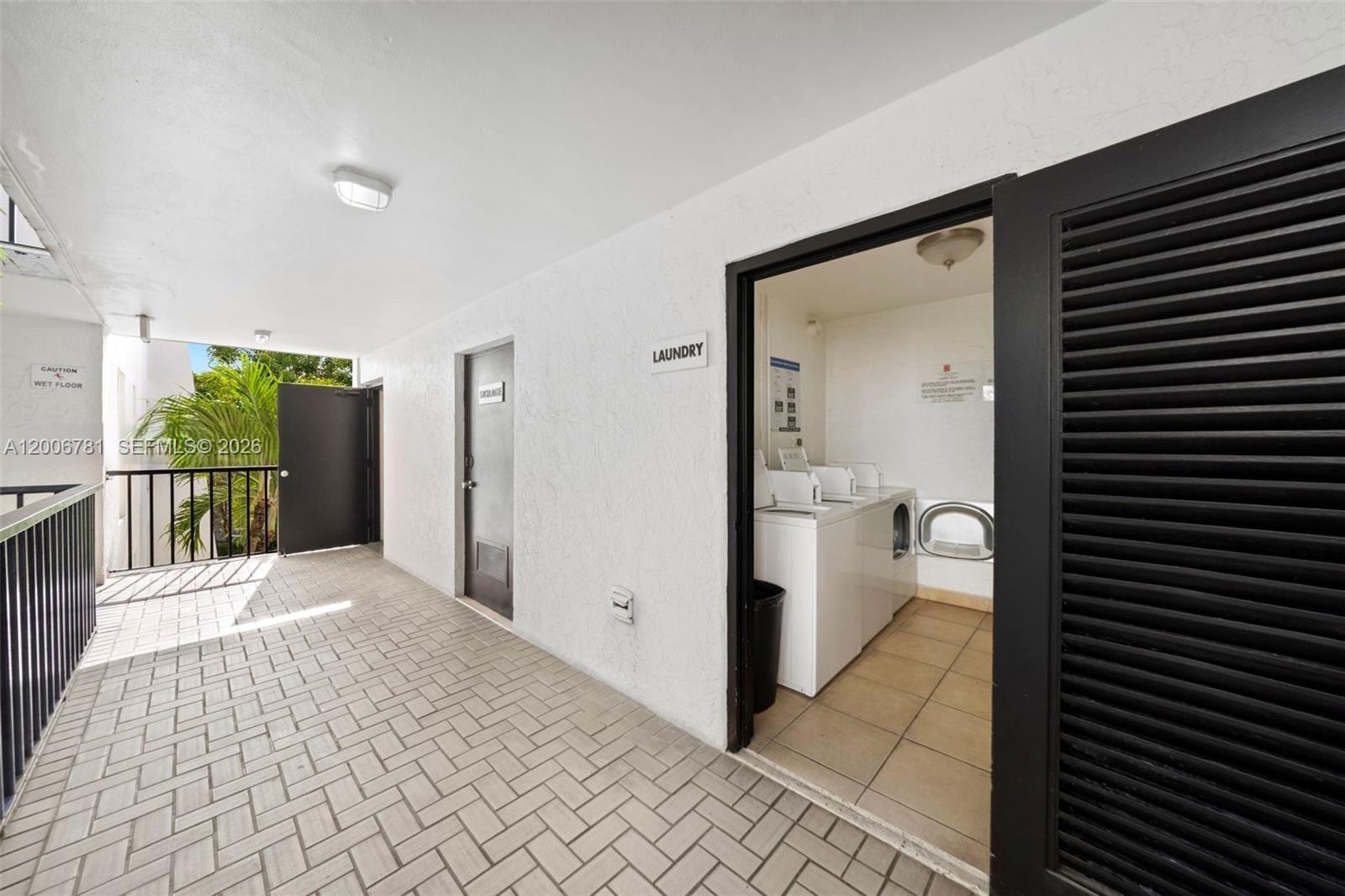 2160 Southwest 16th Avenue, Unit 417 Miami, FL 33145 - Photo 21 of 24 a bathroom with a bathtub and a toilet