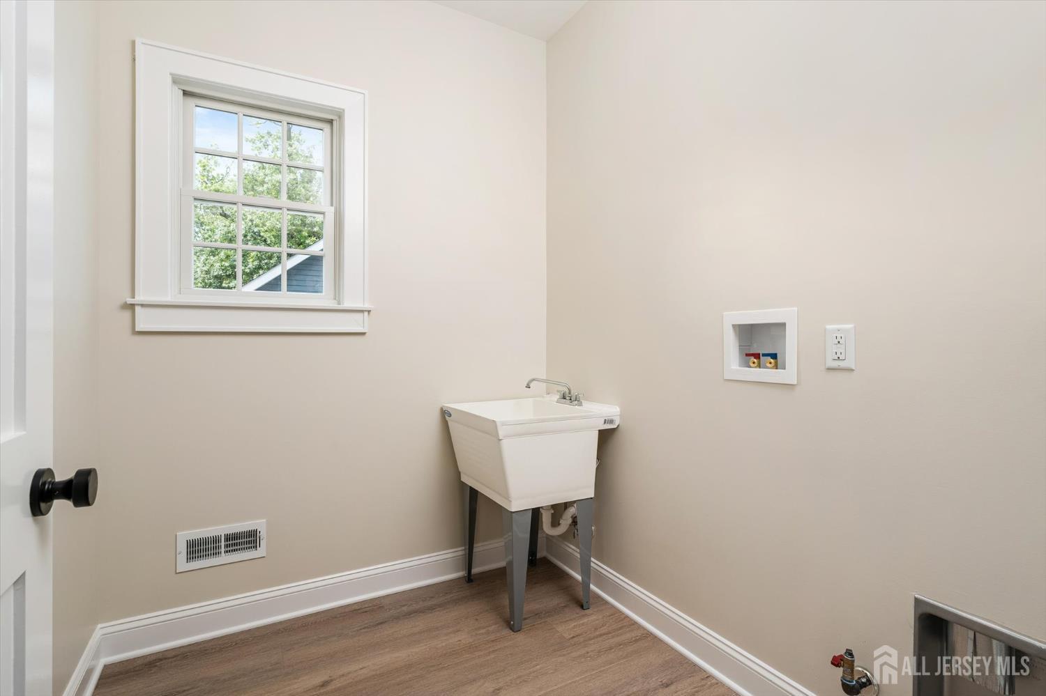 438 Ellisdale Road Chesterfield, NJ 08515 - Photo 14 of 28 a room with a sink and a window