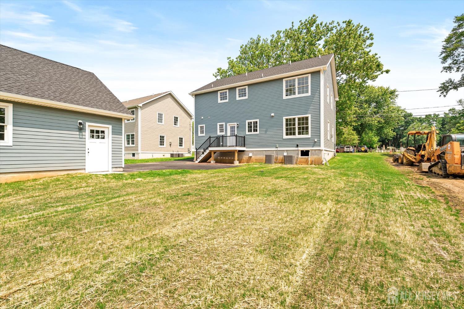 438 Ellisdale Road Chesterfield, NJ 08515 - Photo 27 of 28 a front view of a house with a yard