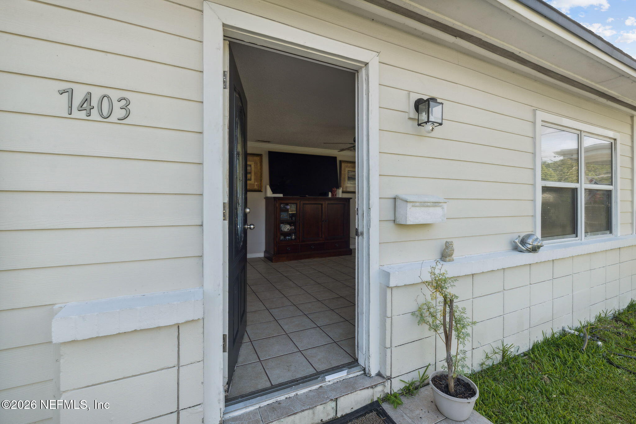 7403 Roslyn Road Jacksonville, FL 32244 - Photo 5 of 28 Front entrance