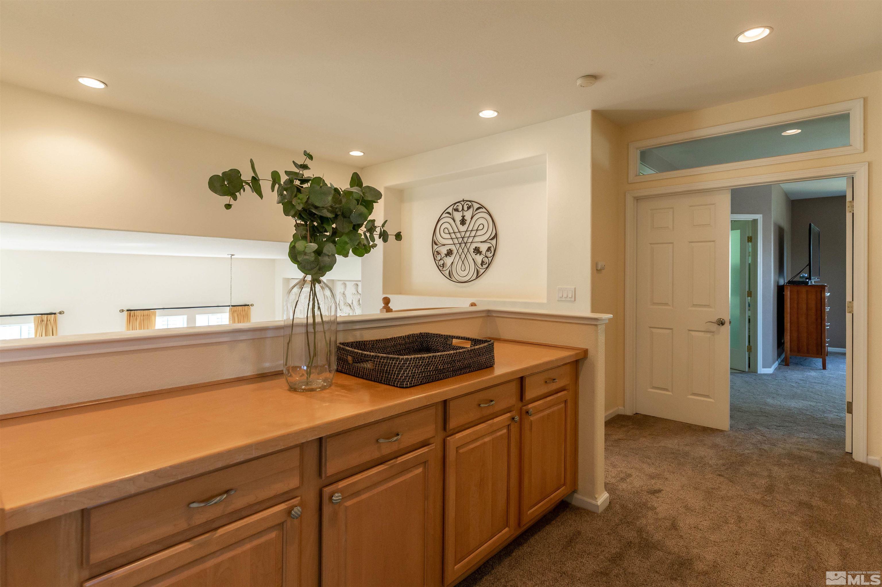 4829 Ramcreek Trail Reno, NV 89519 - Photo 15 of 40 a kitchen with a sink and cabinets