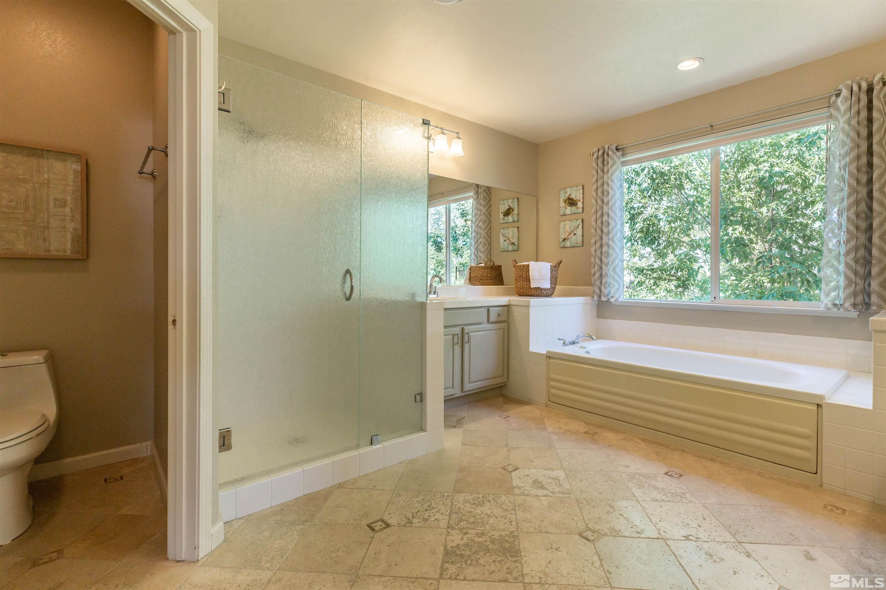 4829 Ramcreek Trail Reno, NV 89519 - Photo 20 of 40 a bathroom with a sink toilet and shower