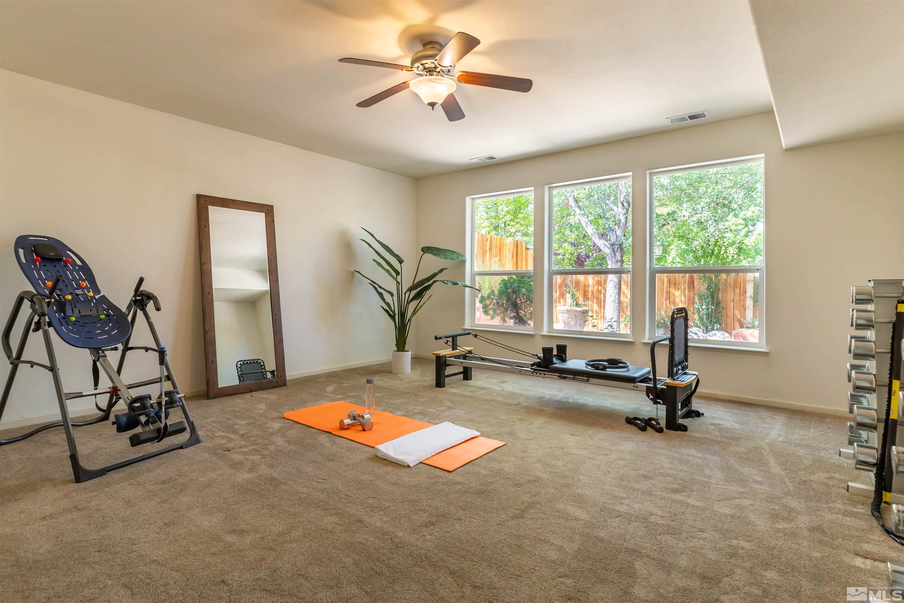 4829 Ramcreek Trail Reno, NV 89519 - Photo 31 of 40 a view of a room with gym equipment