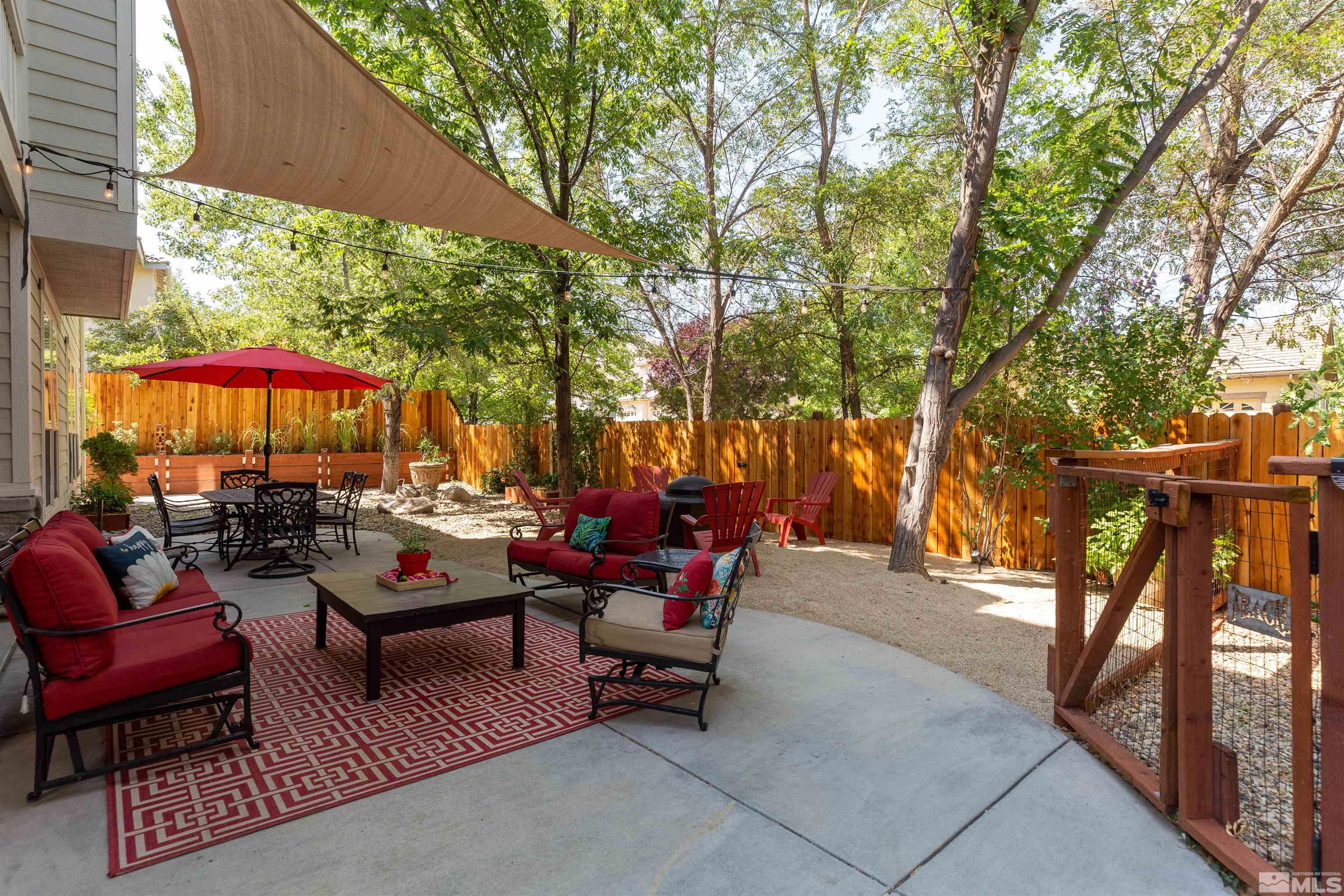 4829 Ramcreek Trail Reno, NV 89519 - Photo 34 of 40 a backyard of a house with outdoor seating