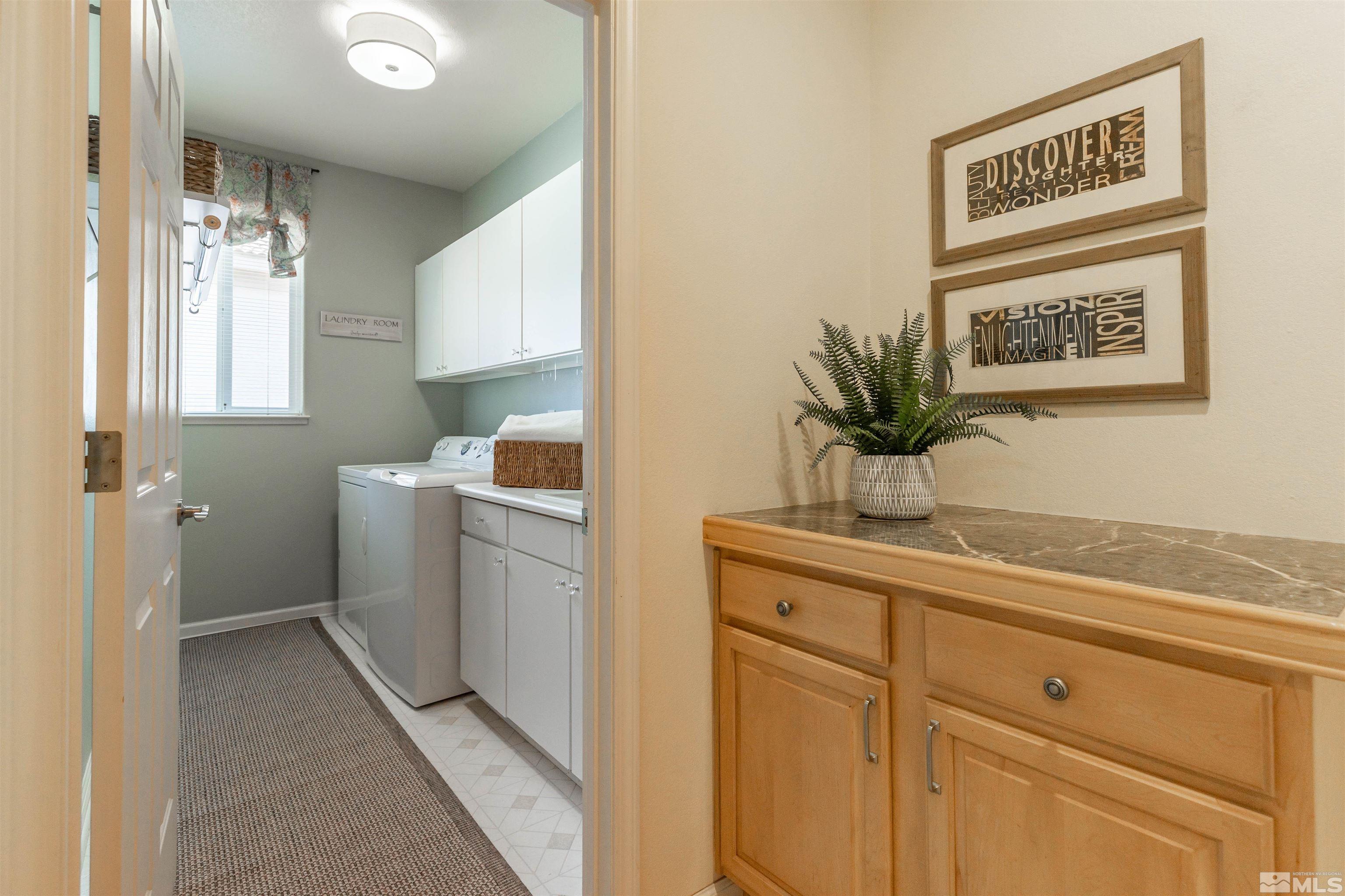 4829 Ramcreek Trail Reno, NV 89519 - Photo 37 of 40 a hallway with a washer and dryer