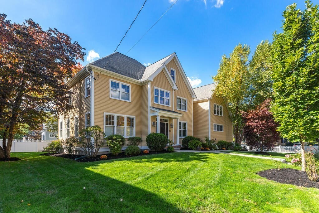 20 Ellison Road Lexington, MA 02421 - Photo 1 of 1 a front view of house with yard and green space
