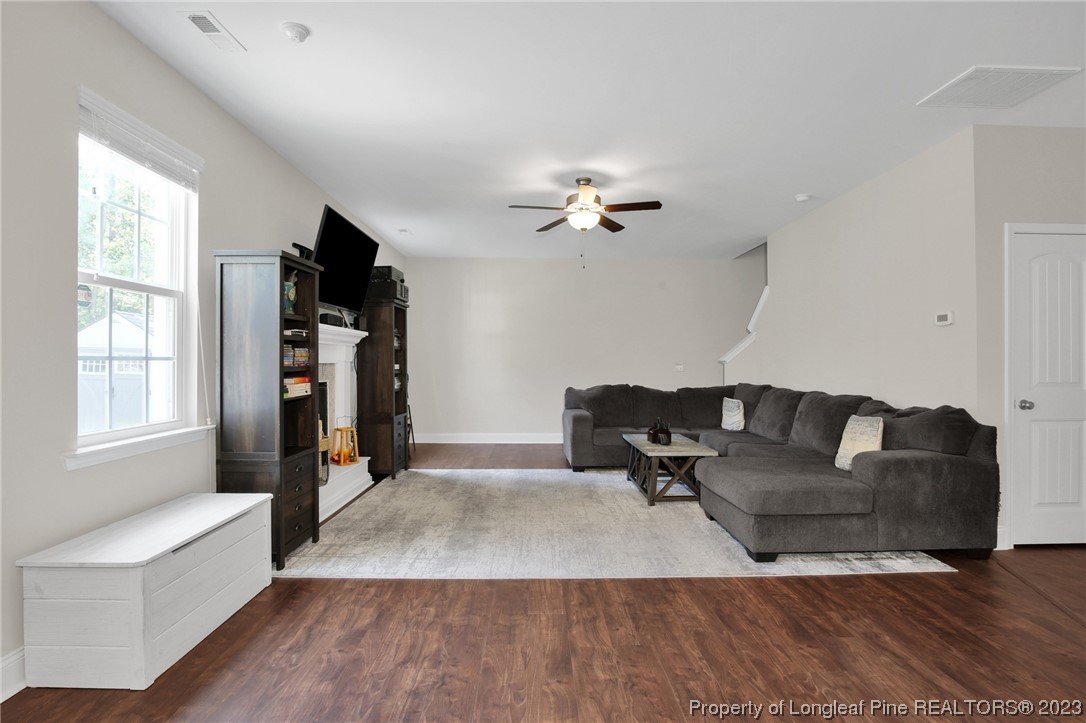 90 Eaker Drive Cameron, NC 28326 - Photo 11 of 36 a living room with furniture and a window