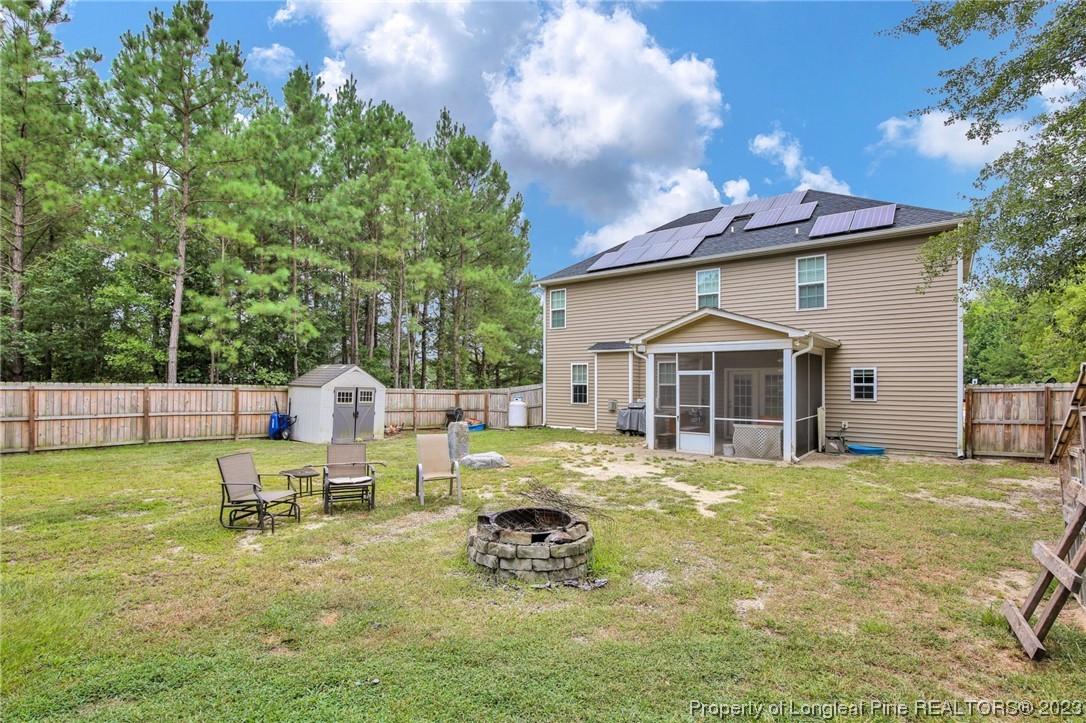 90 Eaker Drive Cameron, NC 28326 - Photo 31 of 36 a view of a house with swimming pool and sitting area