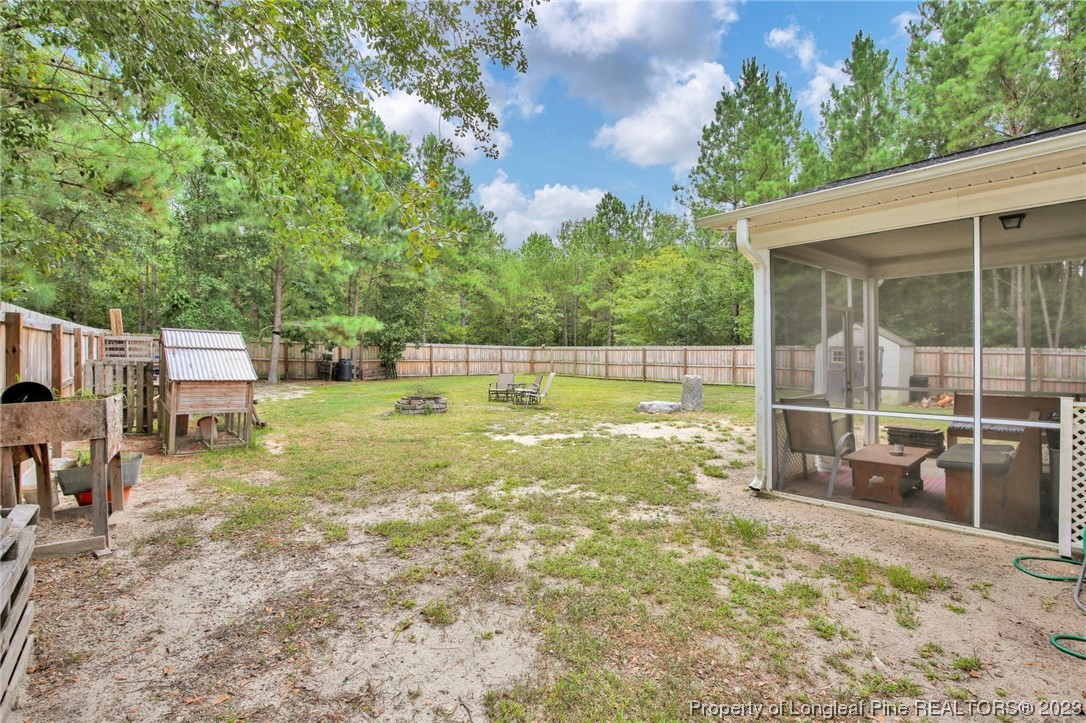 90 Eaker Drive Cameron, NC 28326 - Photo 33 of 36 a view of a backyard