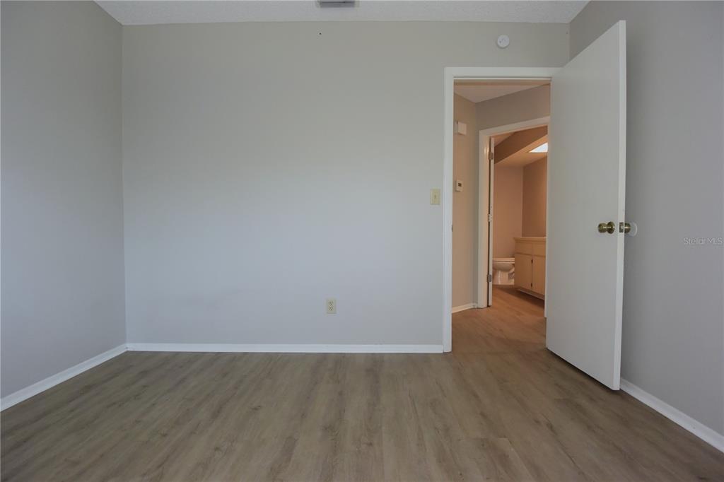 11341 Timbercrest Road Spring Hill, FL 34608 - Photo 20 of 35 a view of a room with wooden floor