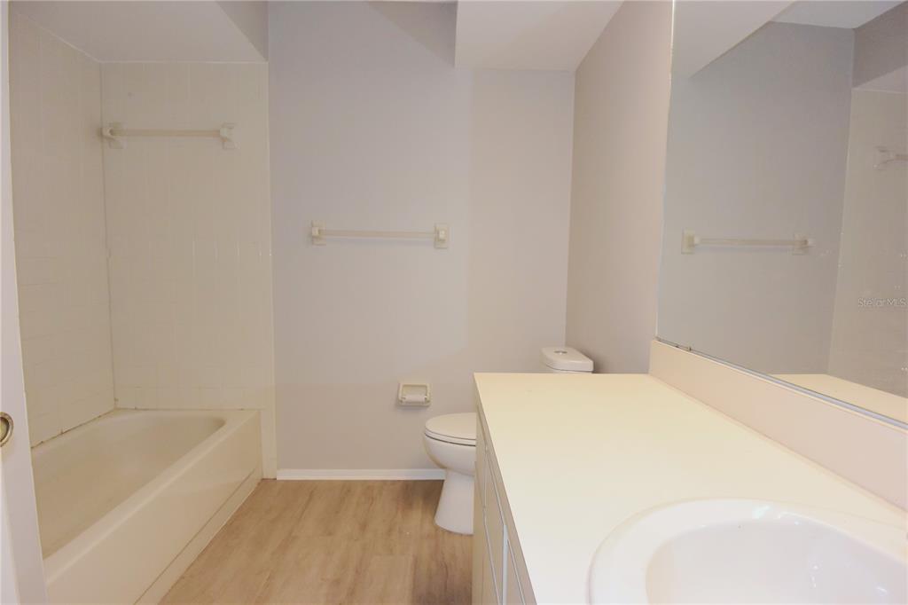 11341 Timbercrest Road Spring Hill, FL 34608 - Photo 21 of 35 a bathroom with a sink a toilet and bathtub