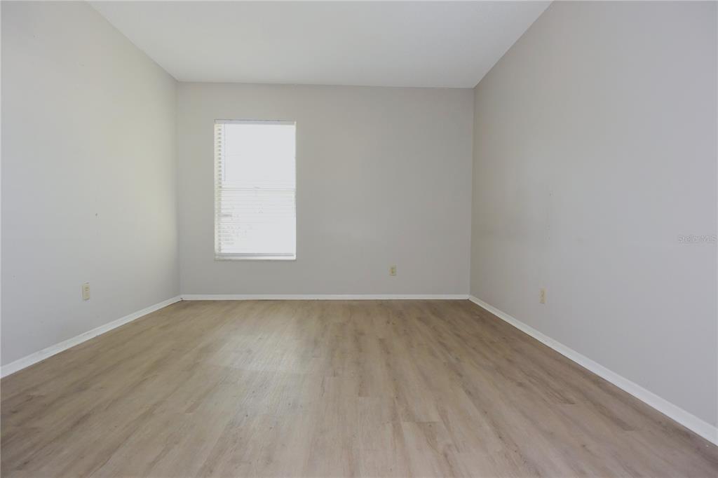 11341 Timbercrest Road Spring Hill, FL 34608 - Photo 23 of 35 an empty room with a window