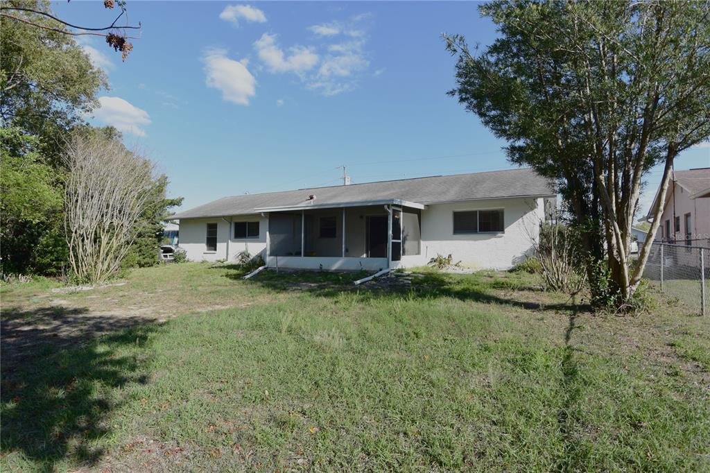 11341 Timbercrest Road Spring Hill, FL 34608 - Photo 30 of 35 a front view of a house with garden