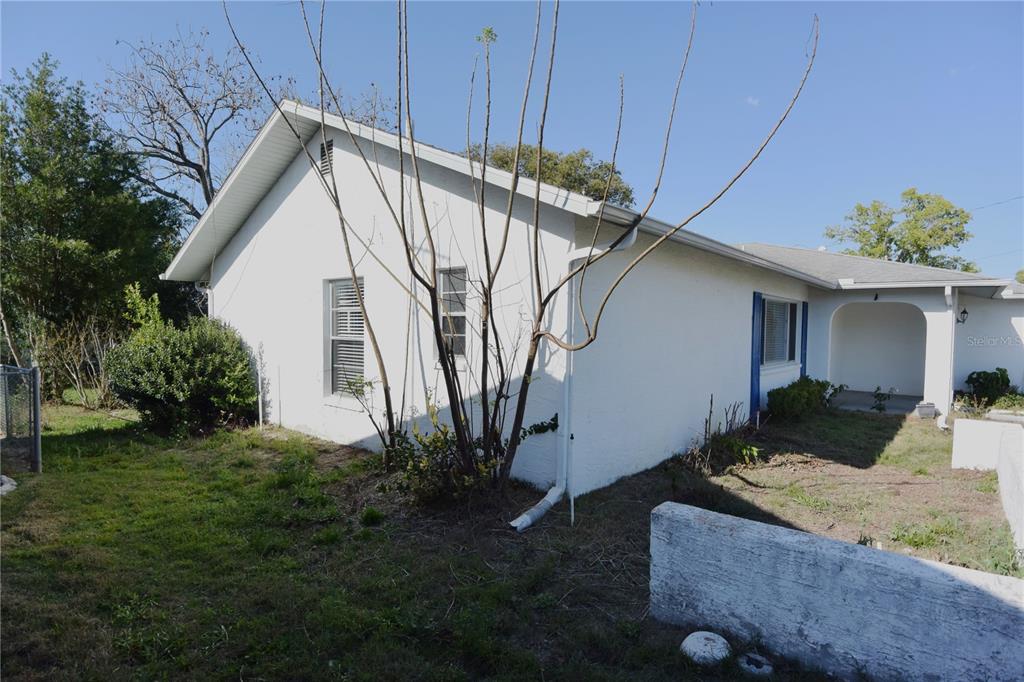11341 Timbercrest Road Spring Hill, FL 34608 - Photo 31 of 35 a house view with a backyard space