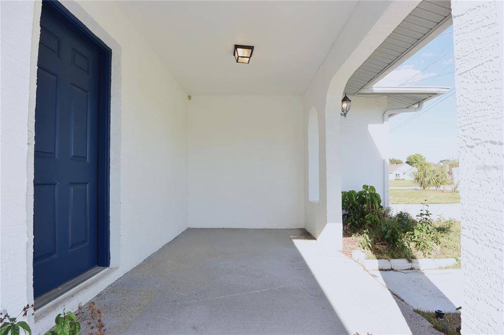 11341 Timbercrest Road Spring Hill, FL 34608 - Photo 4 of 35 a view of entryway with wooden floor