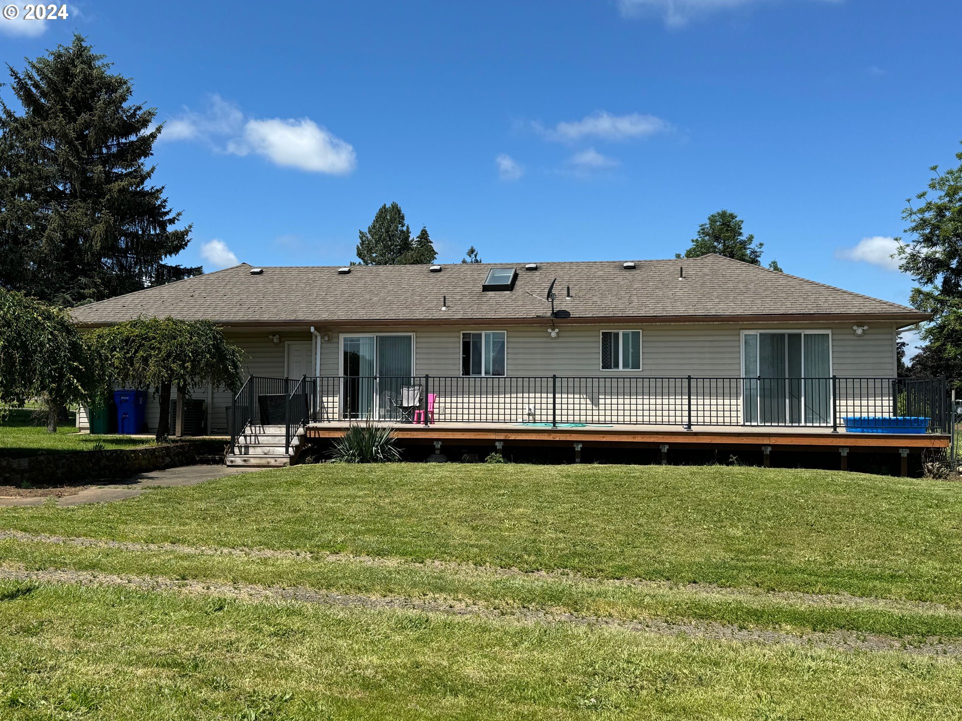 29815 Southeast Kelso Road Boring, OR 97009 - Photo 5 of 21 a front view of a house with a garden