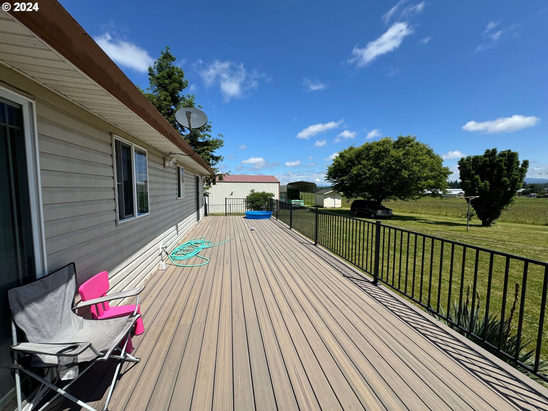 29815 Southeast Kelso Road Boring, OR 97009 - Photo 6 of 21 a view of a house with backyard and sitting area