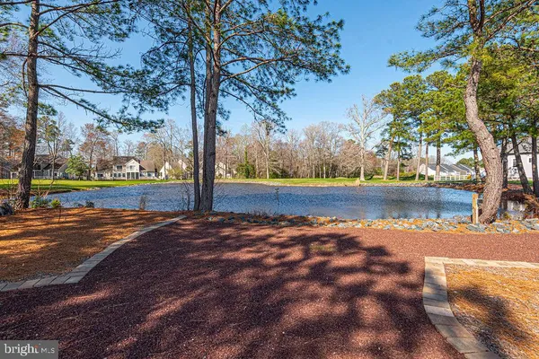 a view of a lake view with a barn