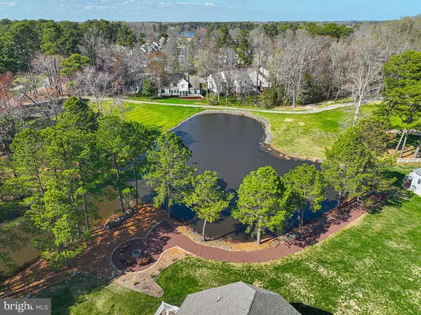 a view of a garden with a lake view
