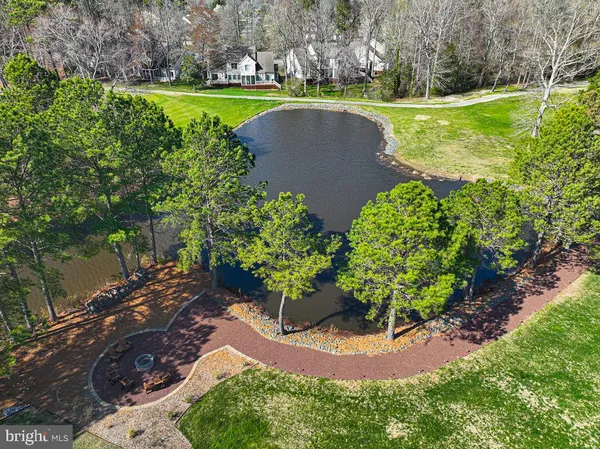 a view of a garden with a lake