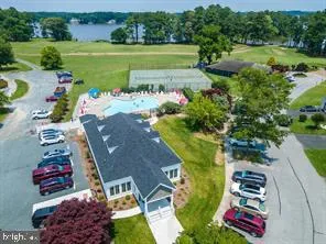 an aerial view of a house with a garden