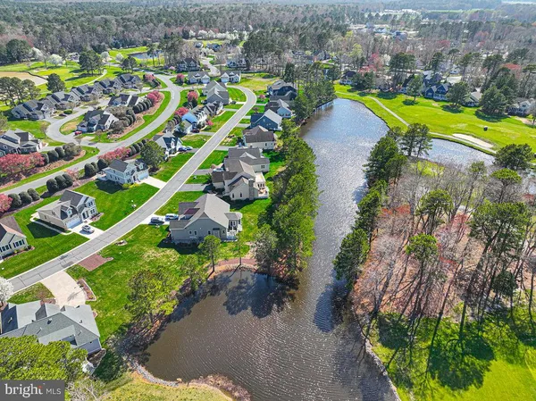 a view of a lake with a city
