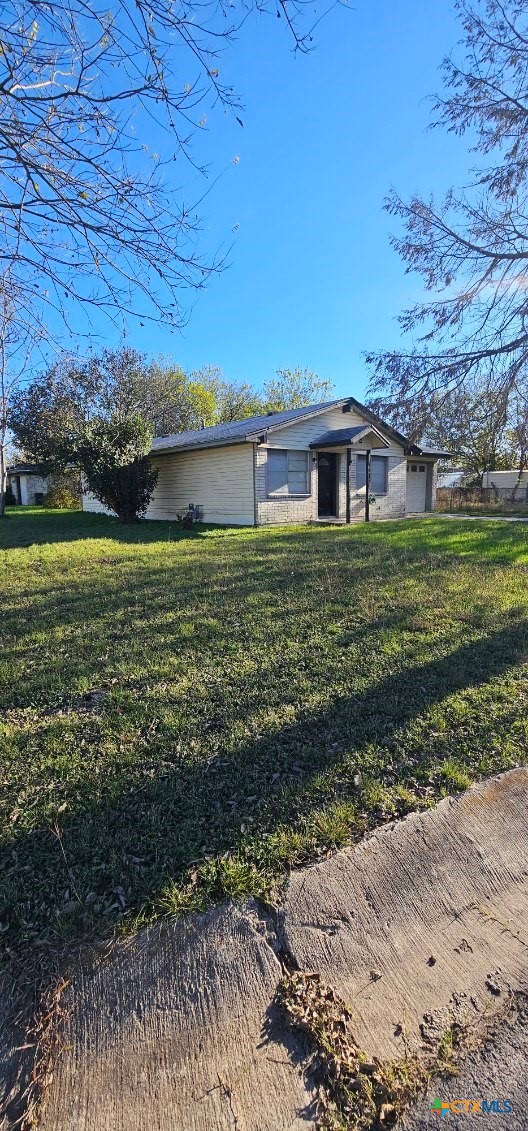 12 Sunset Drive Lampasas, TX 76550 - Photo 14 of 25 a front view of a house with a yard