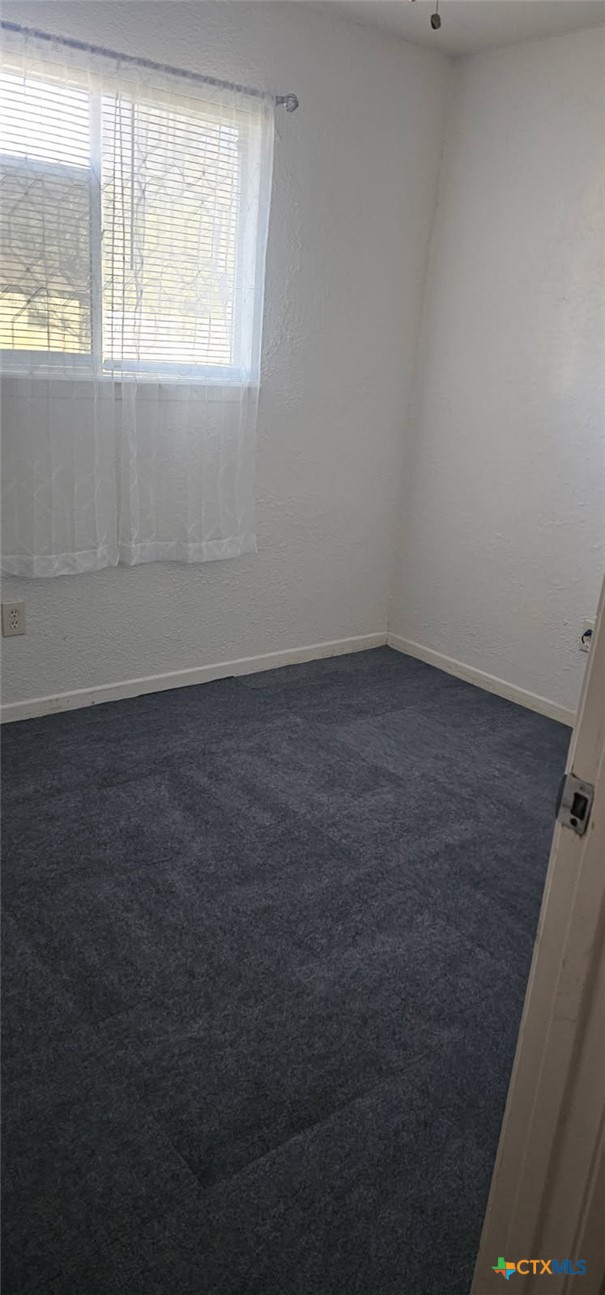 12 Sunset Drive Lampasas, TX 76550 - Photo 16 of 25 an empty room with a window