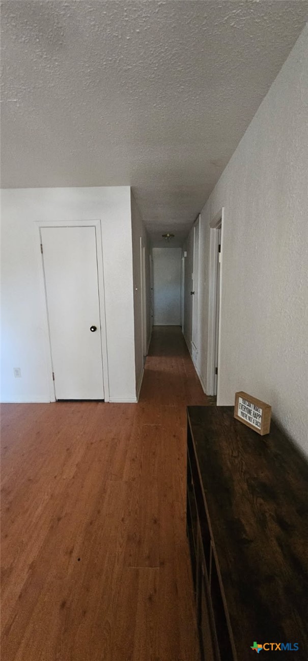 12 Sunset Drive Lampasas, TX 76550 - Photo 24 of 25 a view of an empty room and wooden floor