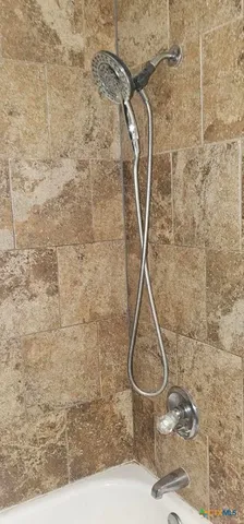 a utility room with a shower