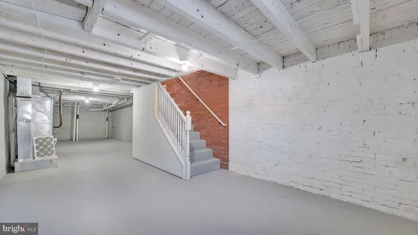 a view of a hallway with staircase