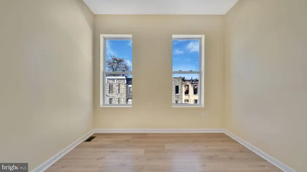 an empty room with windows