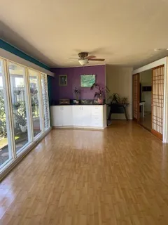 a view of a room with furniture and a fireplace