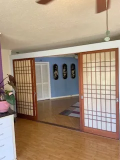 a view of an empty room with windows