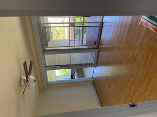 27-641 Ka'ie'ie Road Papaikou, HI 96781 - Photo 15 of 28 wooden floor in an empty room with a window