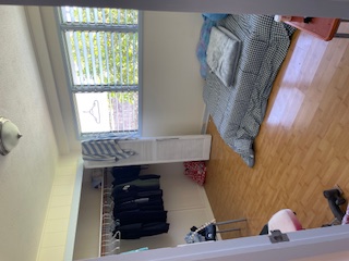 27-641 Ka'ie'ie Road Papaikou, HI 96781 - Photo 20 of 28 a bedroom with a bed and a window