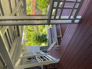 27-641 Ka'ie'ie Road Papaikou, HI 96781 - Photo 23 of 28 a view of a room with wooden floor and windows