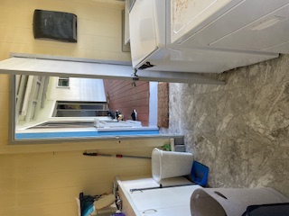 27-641 Ka'ie'ie Road Papaikou, HI 96781 - Photo 25 of 28 a bathroom with a toilet sink and mirror