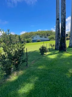a view of a lake with a yard