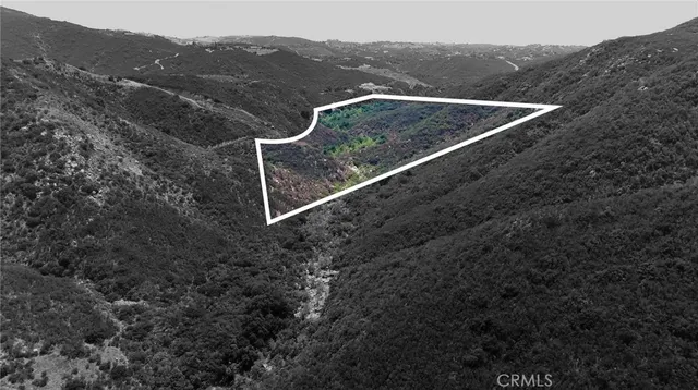 a view of house with mountain view