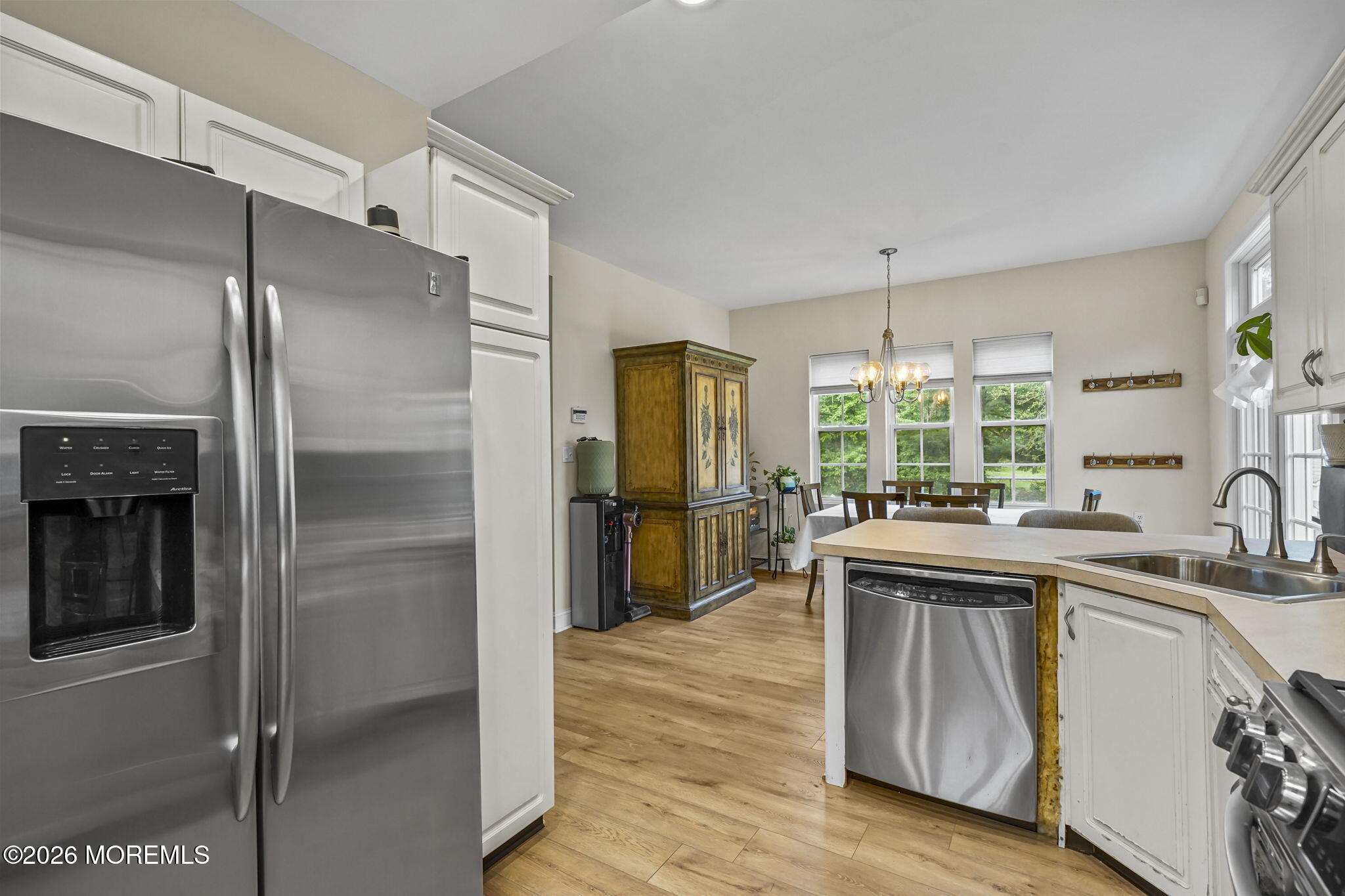 438 Bennetts Mills Road Jackson, NJ 08527 - Photo 12 of 42 a kitchen with kitchen island a sink appliances and cabinets