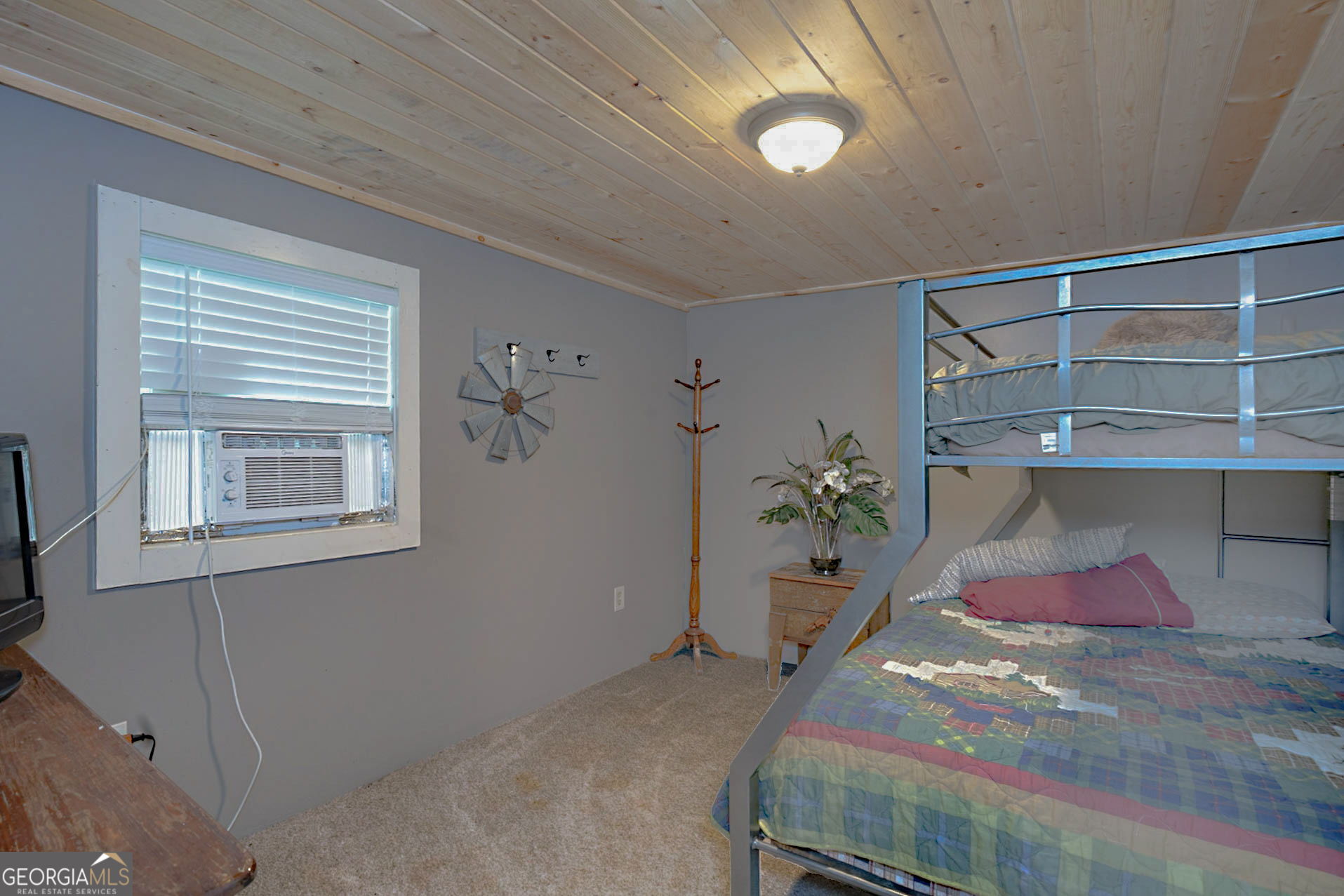 1455 McAllister Road Buena Vista, GA 31803 - Photo 13 of 45 a bedroom with a bed and closet