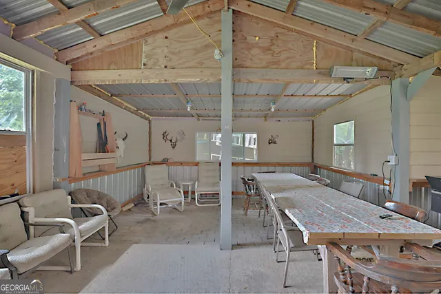 a outdoor space with lots of furniture and windows