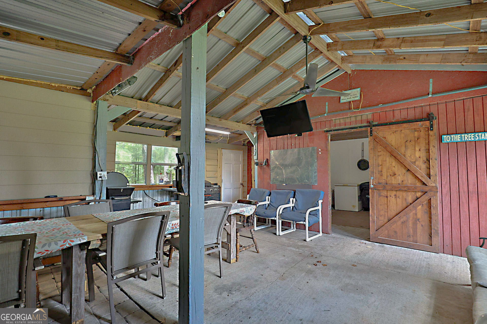1455 McAllister Road Buena Vista, GA 31803 - Photo 34 of 45 a view of a dining room with furniture and chandelier