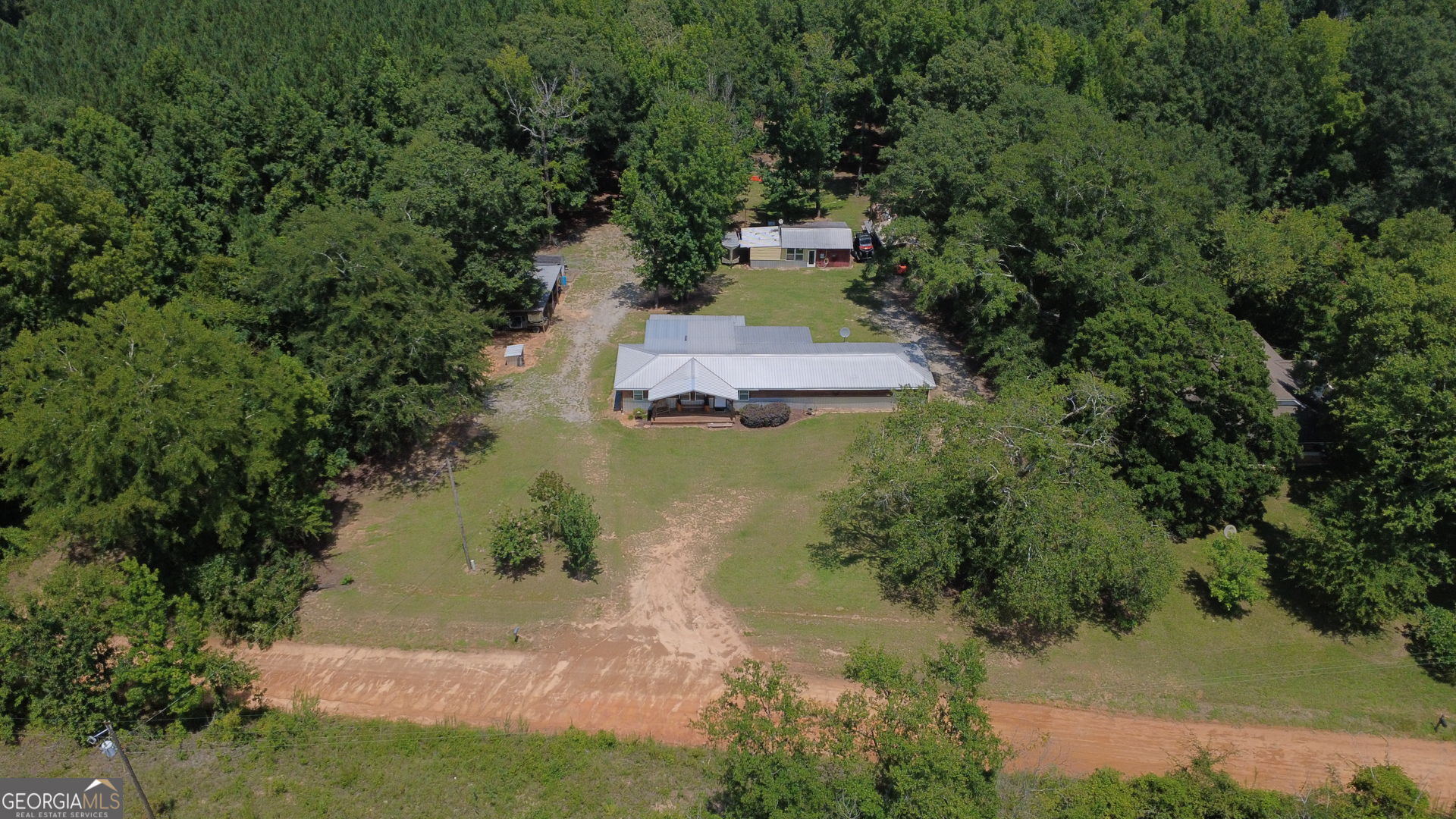 1455 McAllister Road Buena Vista, GA 31803 - Photo 44 of 45 an aerial view of a house with a yard
