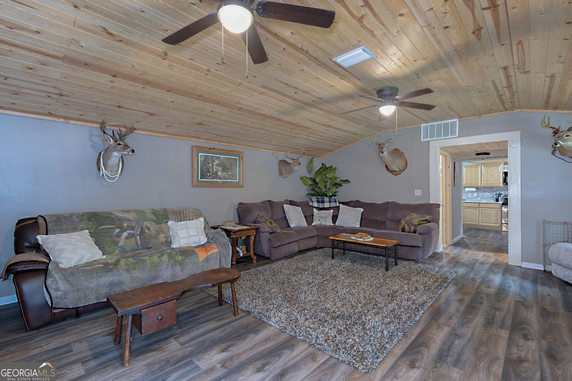 1455 McAllister Road Buena Vista, GA 31803 - Photo 9 of 45 a living room with furniture and wooden floor