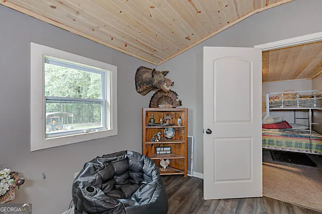 a room with furniture and a window